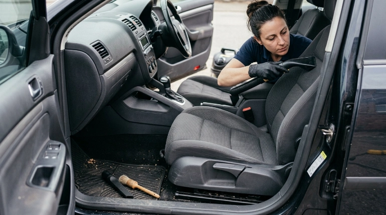 How to vacuum car seats by cleaning fabric seatback, cushion and seams with attachments